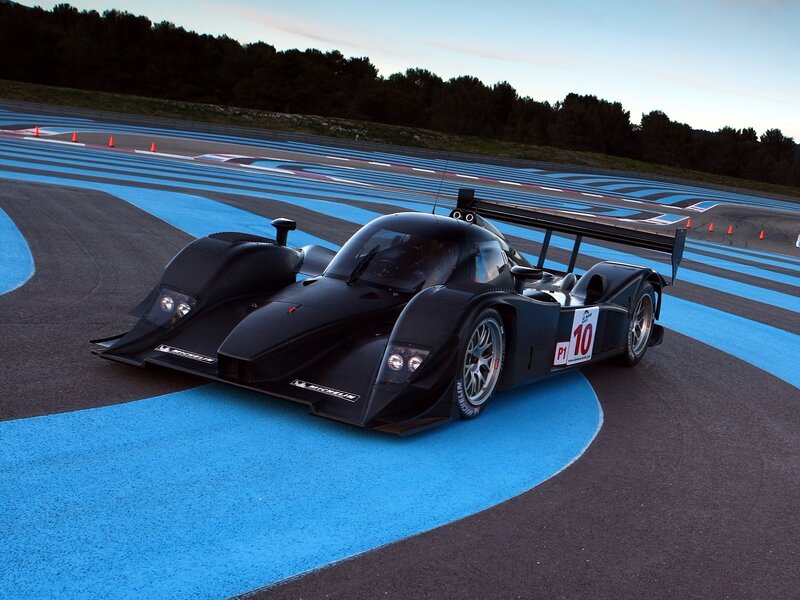 Black Race Car on Track — Dramatic, Sunset, Photograph