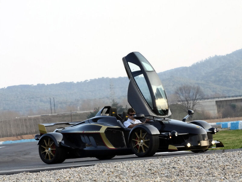 Black Race Car on Track — Dynamic, Afternoon, Photograph, Driver, Mountains