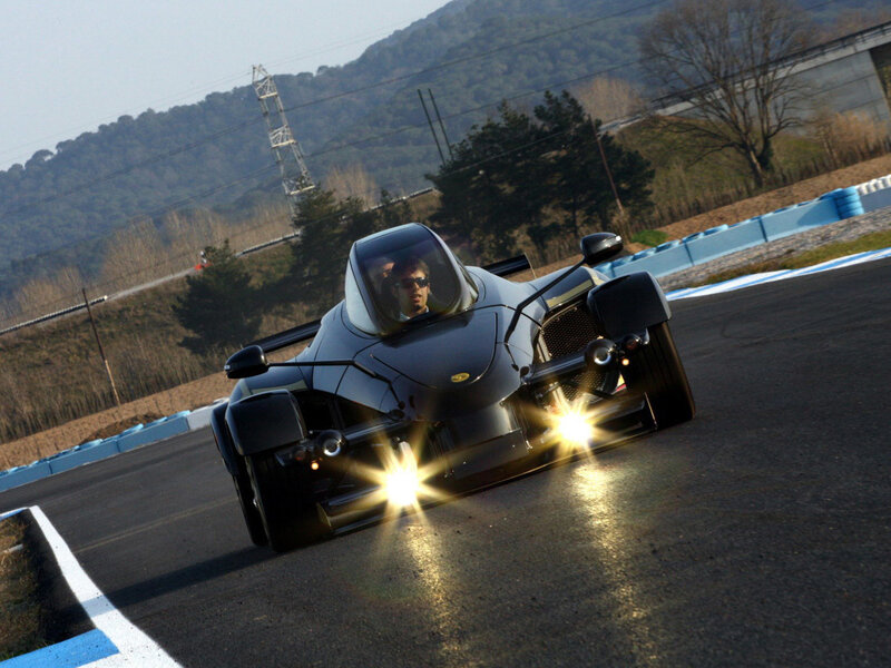 Black Race Car on Track — Dynamic, Afternoon, Photograph, Driver, Race Track, Mountain