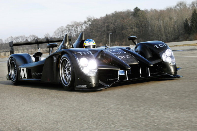 Black Race Car on Track — Dynamic, Afternoon, Photograph, Driver
