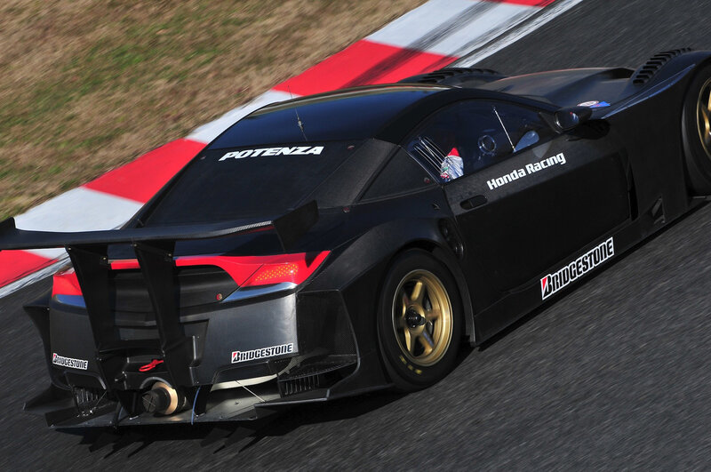 Black Race Car on Track — Dynamic, Afternoon, Photograph, Race Car, Tire