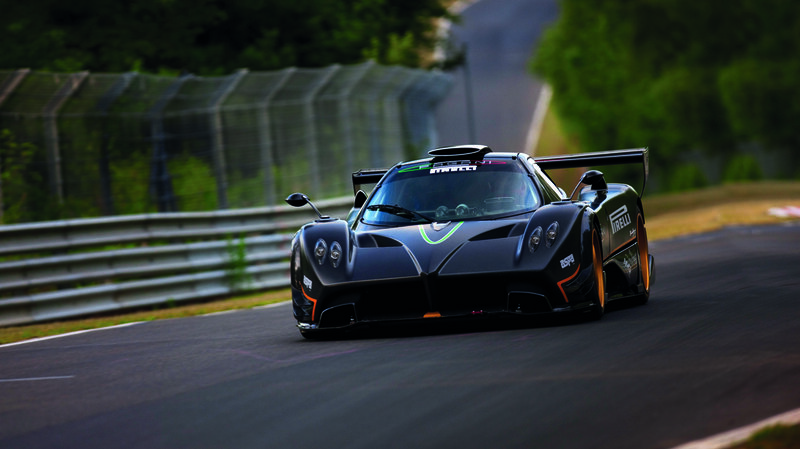 Black Race Car on Track — Dynamic, Afternoon, Photograph, Race Track, Guardrail