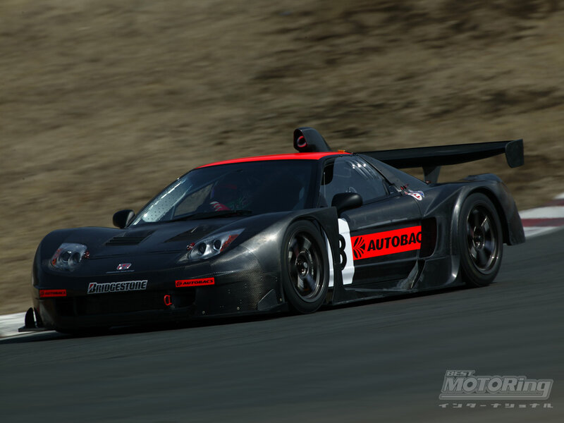 Black Race Car on Track — Dynamic, Afternoon, Photograph