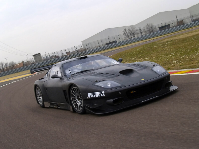 Black Race Car on Track — Dynamic, Morning