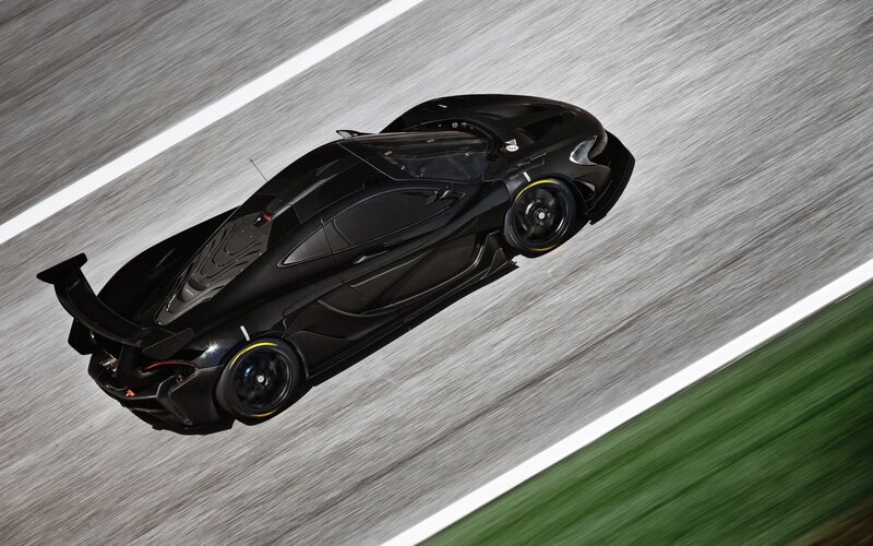 Black Race Car on Track — Dynamic, Photograph, Race Track