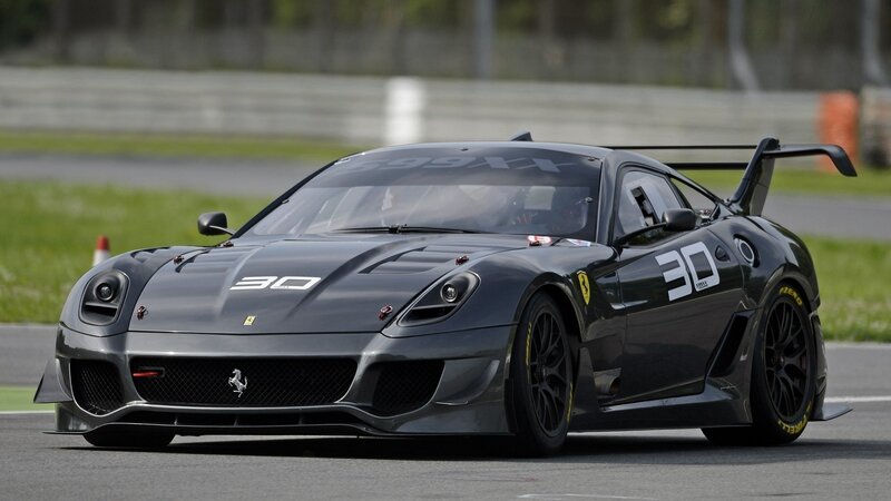 Black Race Car on Track — Gray, Dynamic, Afternoon, Photograph, Race Track