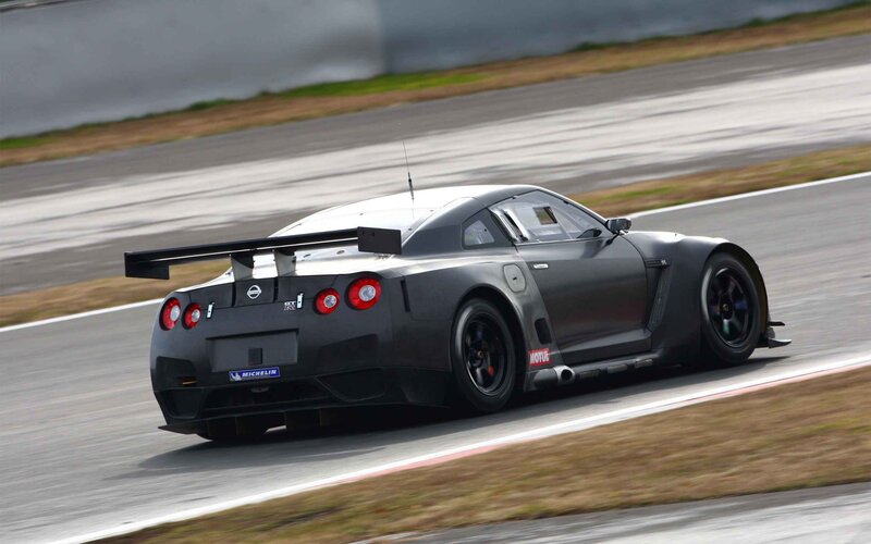 Black Race Car on Track — Gray, Dynamic, Photograph