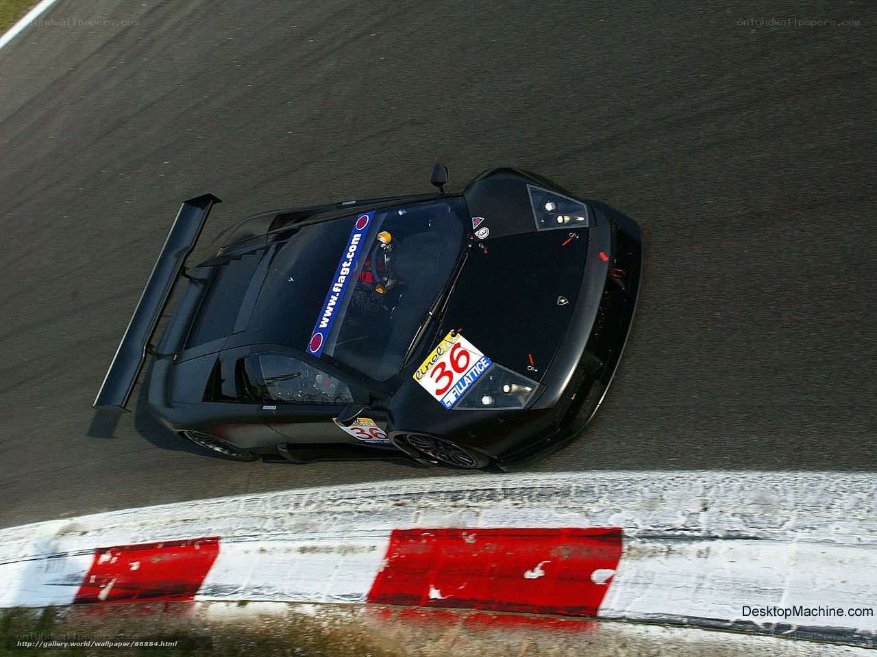 black race car on track