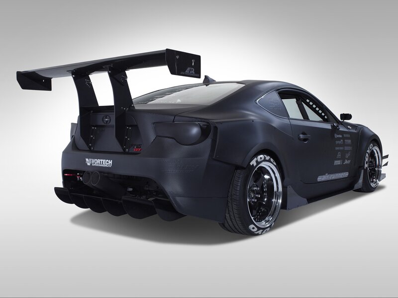 black race car with large wing