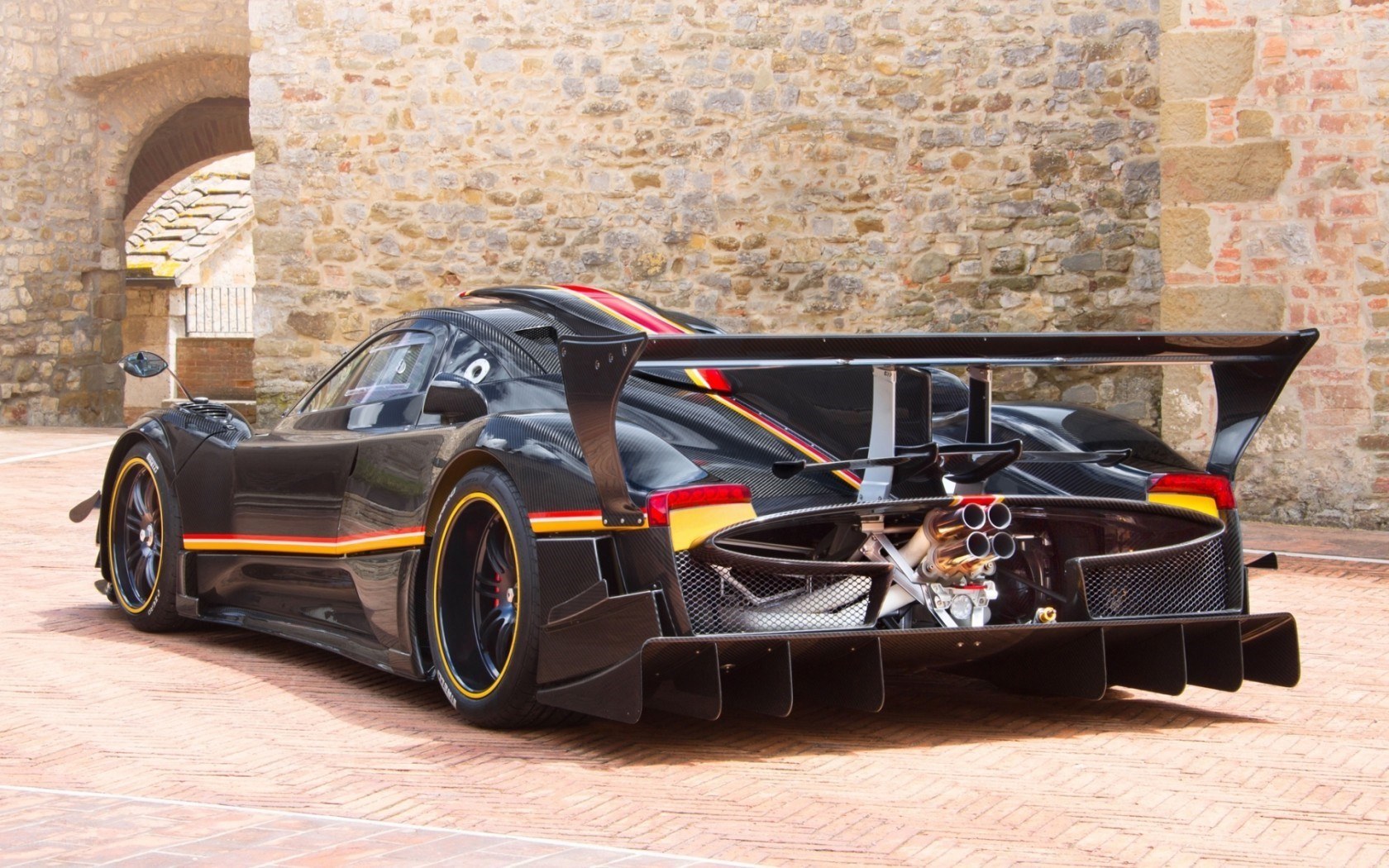 black race car with large wing