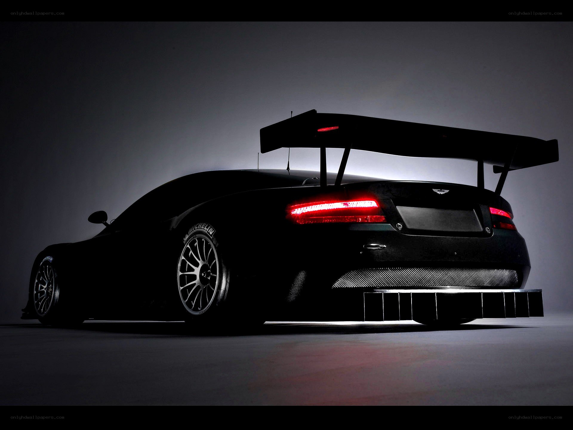 black race car with large wing
