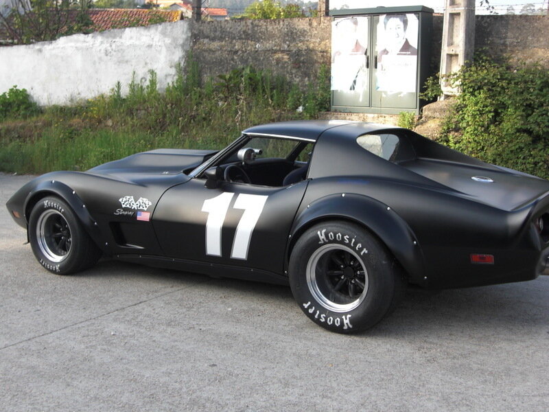 black race car with number 17