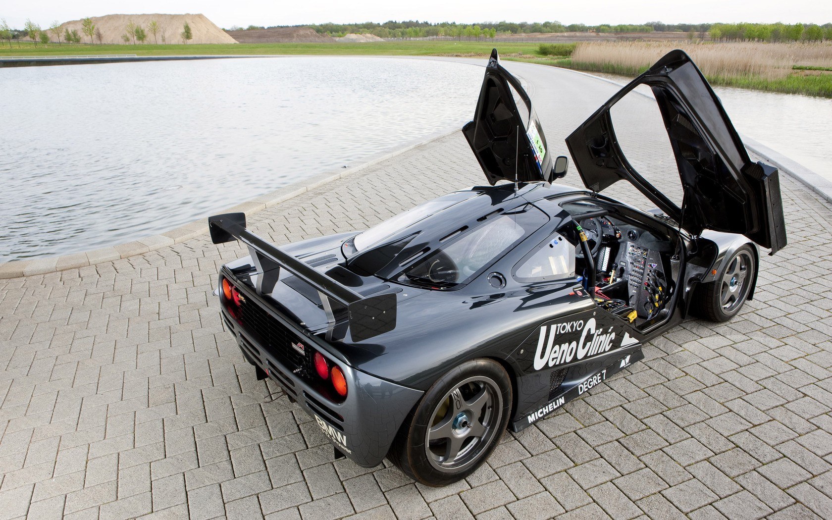 black race car with open doors