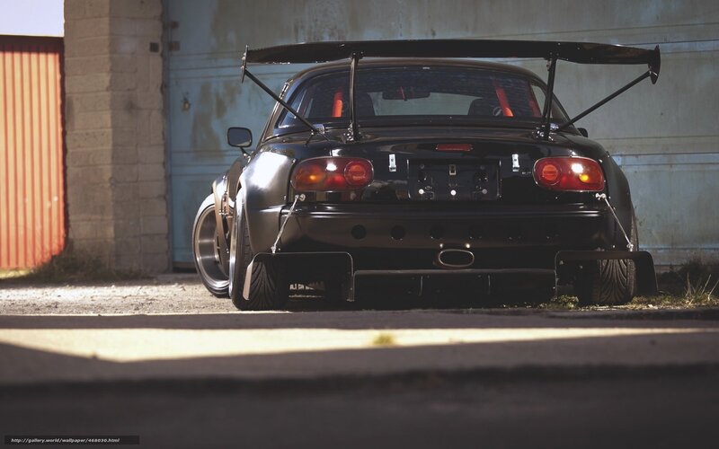 black race car with rear wing
