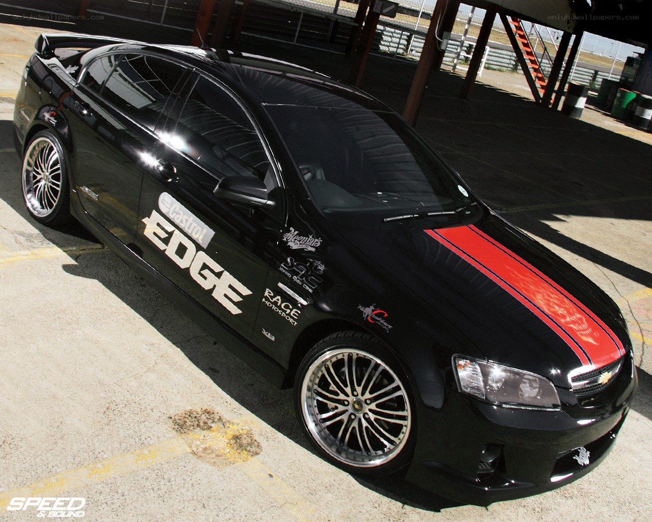 black race car with red stripes