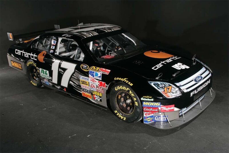 black race car with sponsor logos