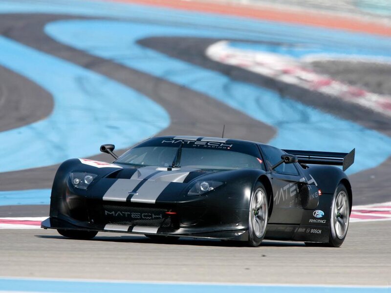 Black Racing Car — Dynamic, Afternoon, Photograph, Race Track