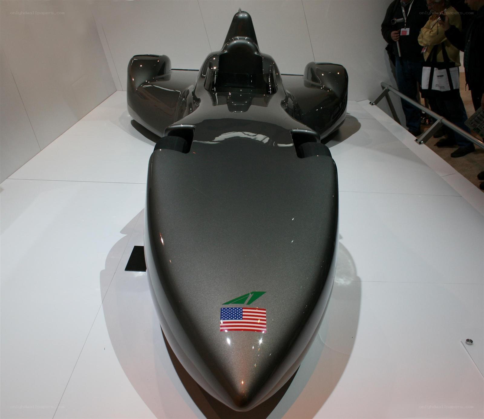 Black racing car on display