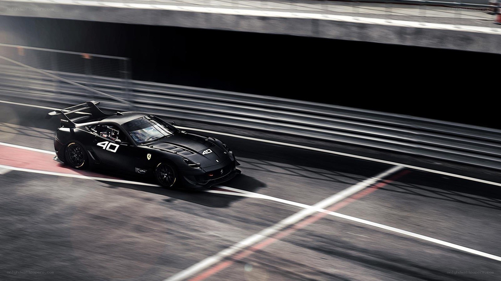 Black racing car on track