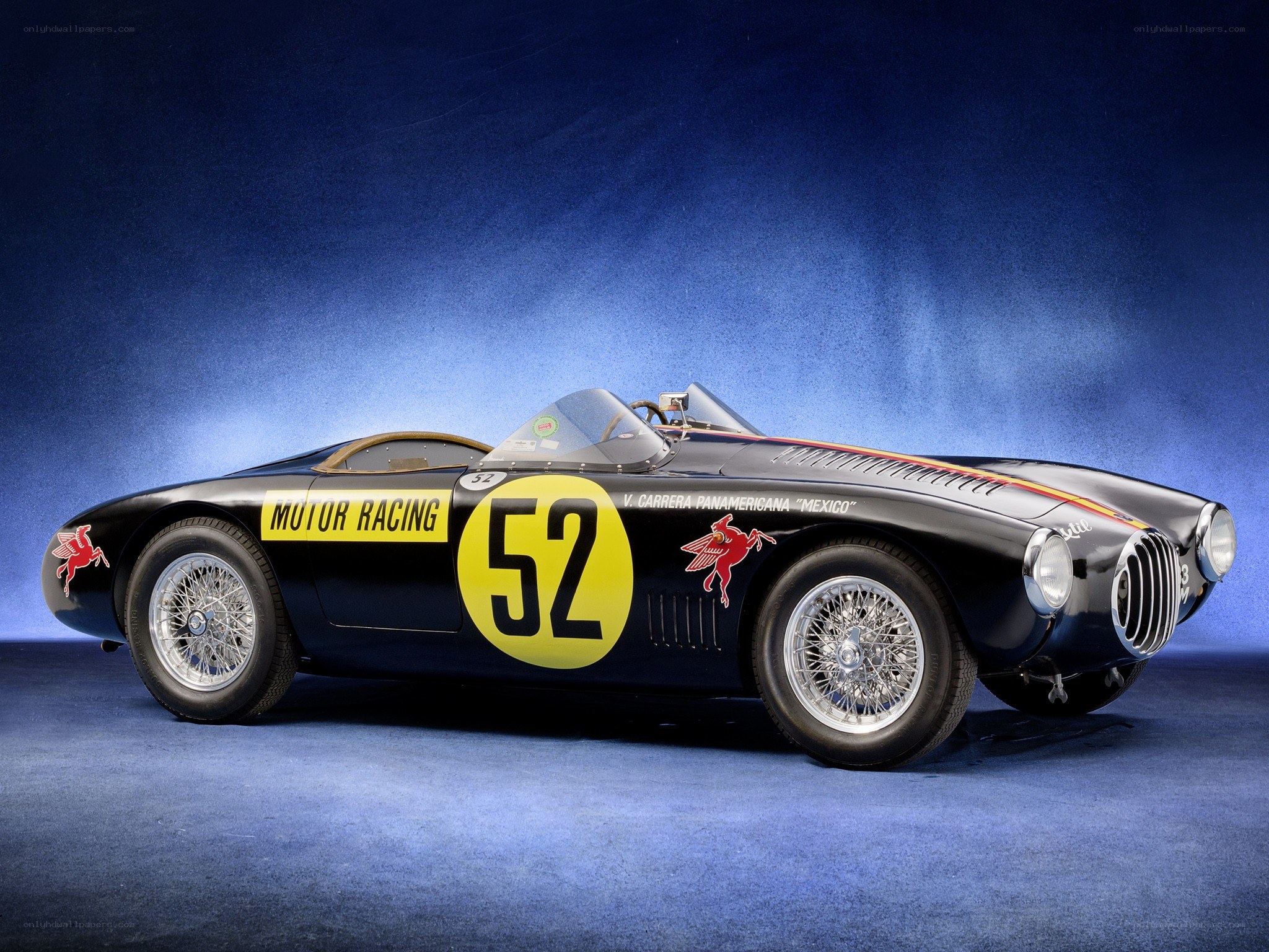 Black racing car with number 52