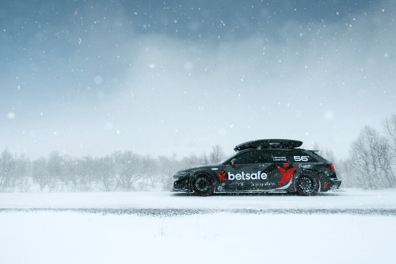 Black Rally Car in Snow