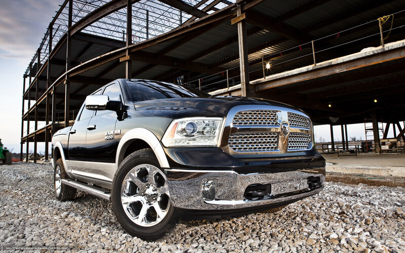 Black Ram 1500 truck at construction site