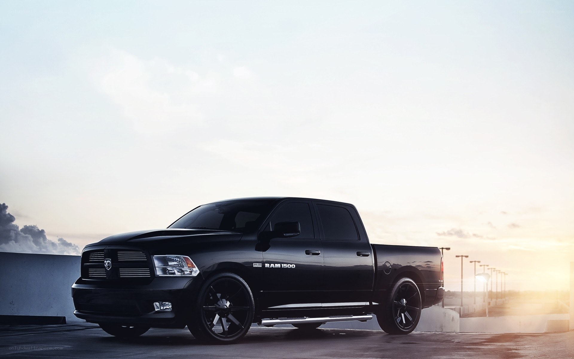 Black Ram 1500 truck at sunset