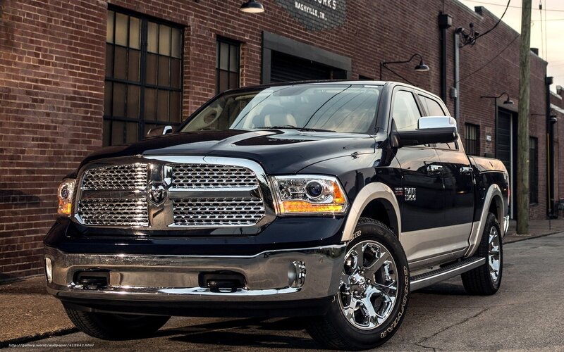 Black Ram 1500 truck in alley