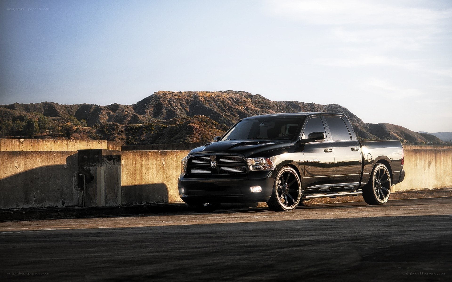 Black Ram pickup on a bridge
