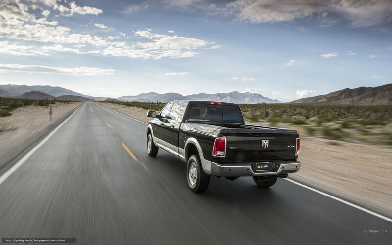 black ram pickup on desert road