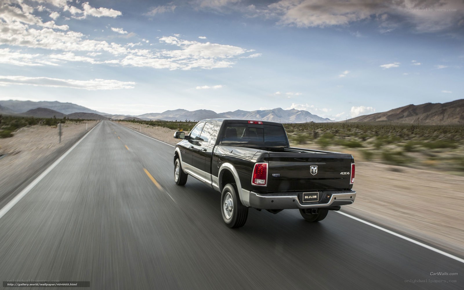 black ram pickup on desert road