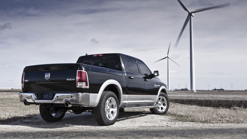 Black Ram pickup truck in field