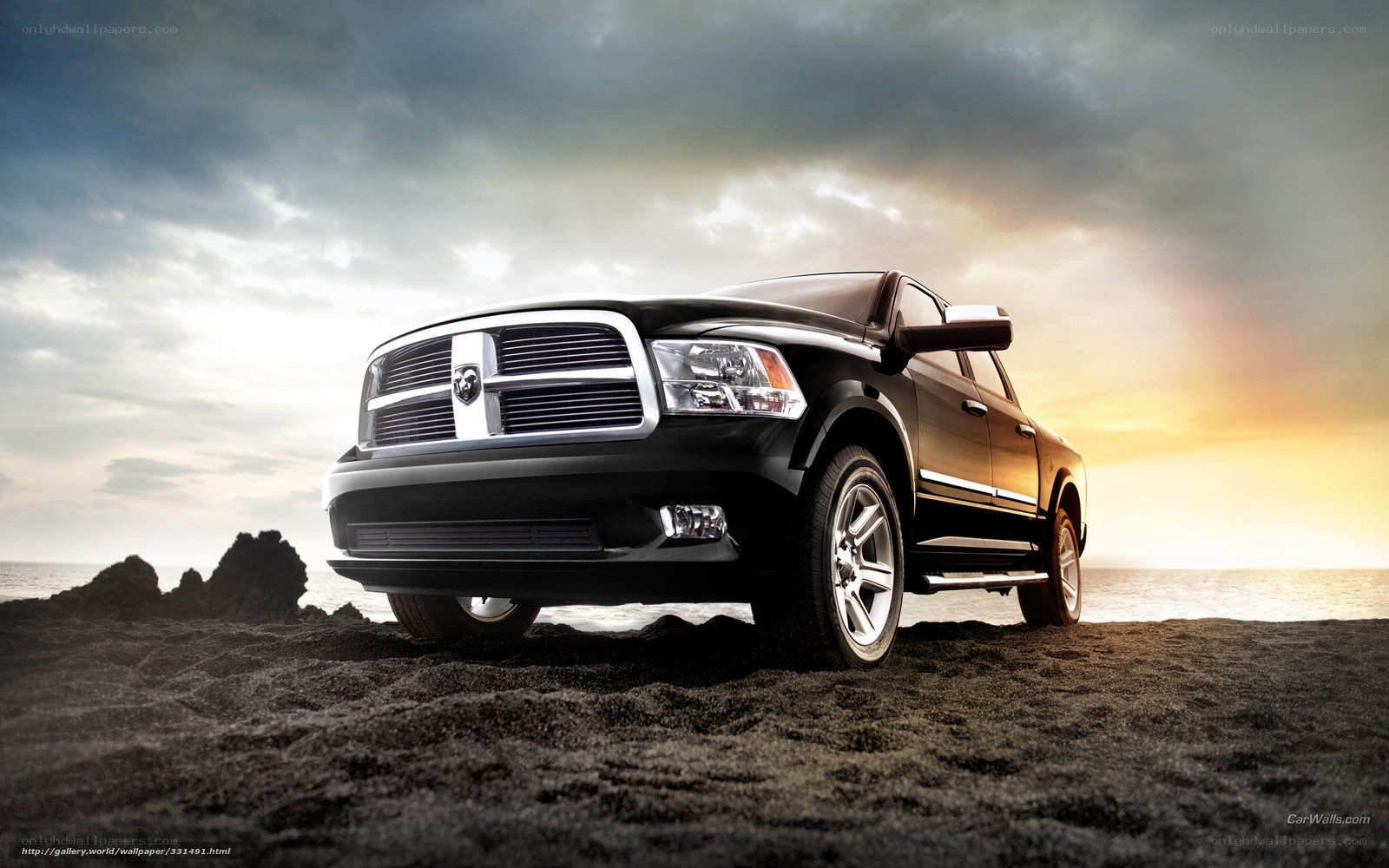 Black Ram truck on beach