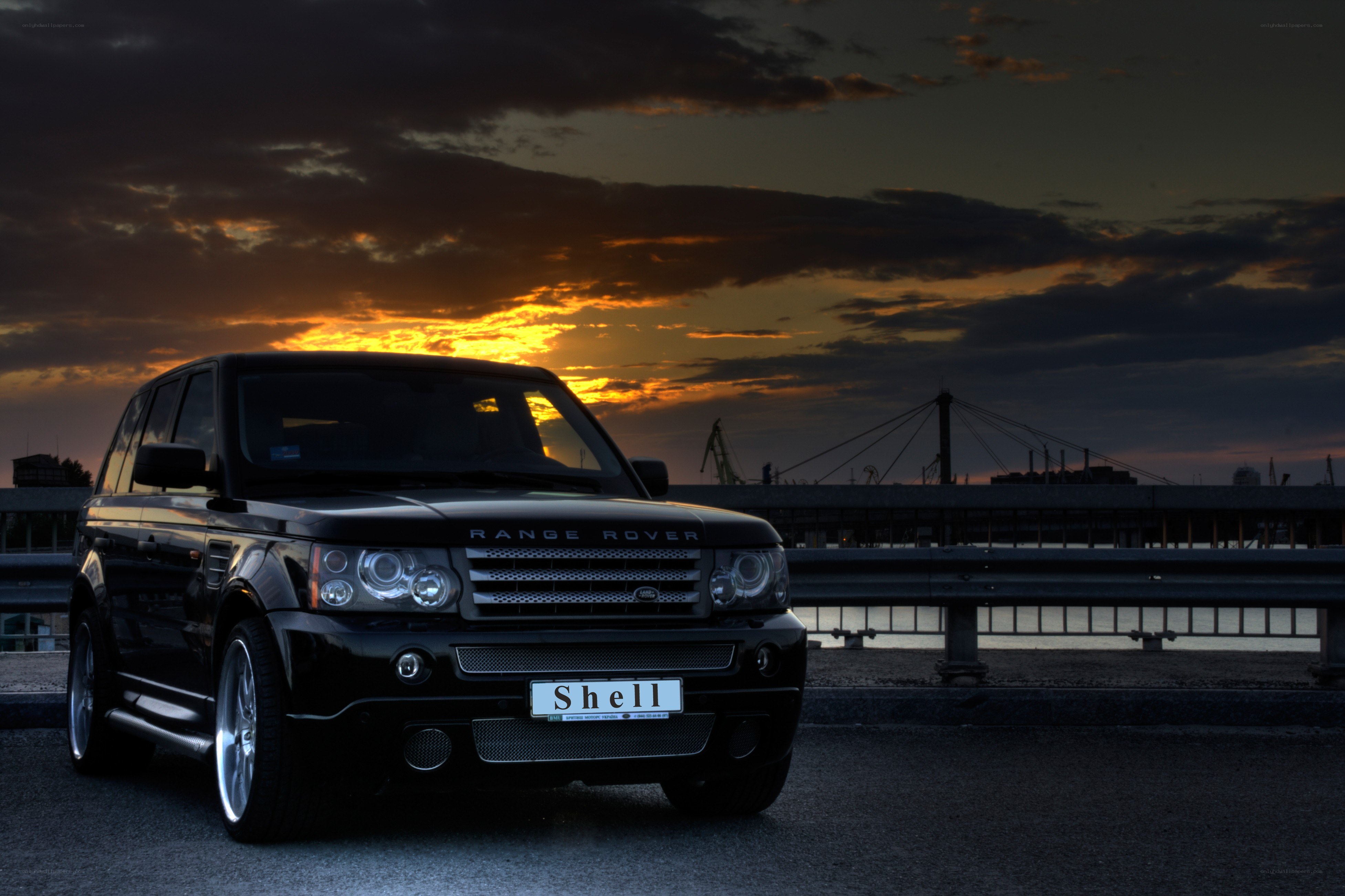 Black Range Rover at sunset
