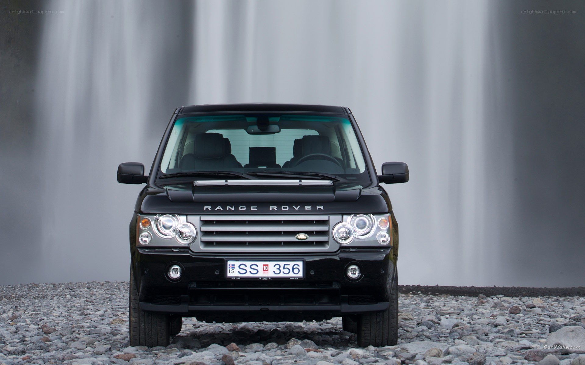 Black Range Rover by waterfall