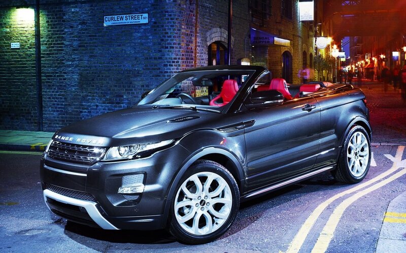 Black Range Rover convertible at night