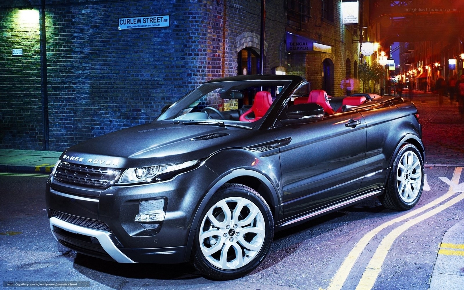 Black Range Rover convertible at night