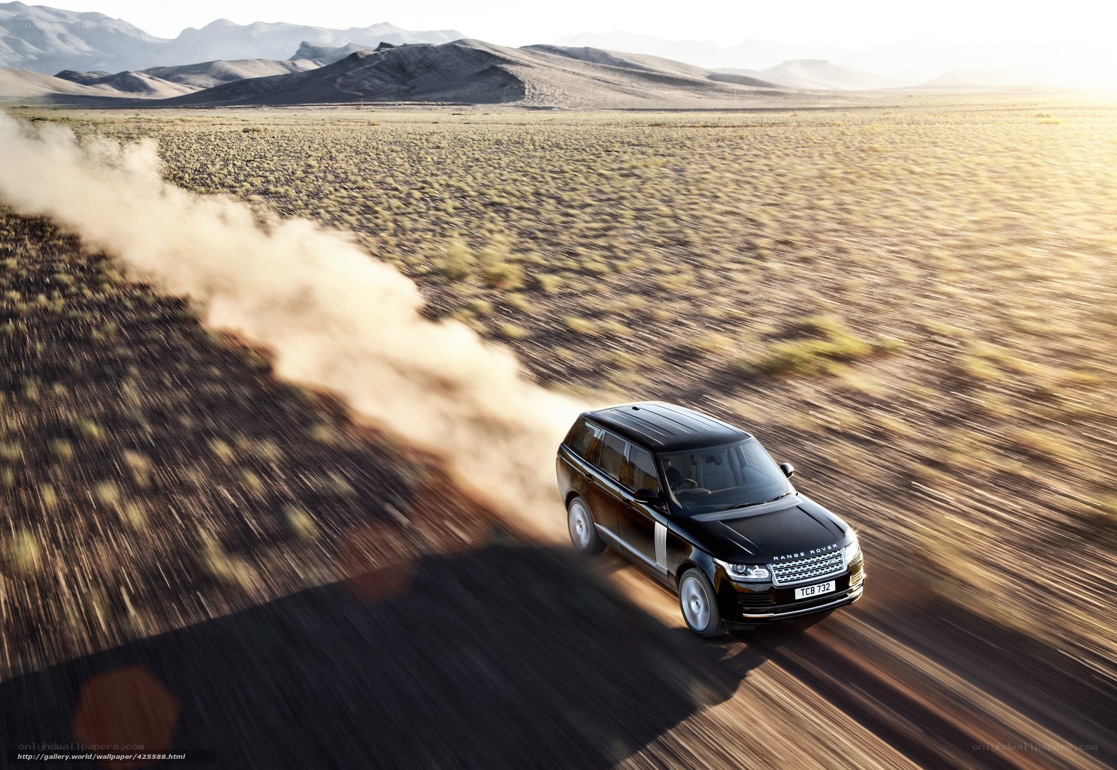 Black Range Rover in desert