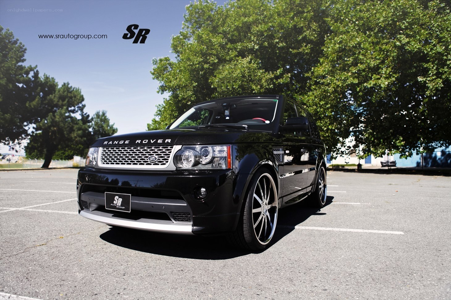 Black Range Rover in parking lot