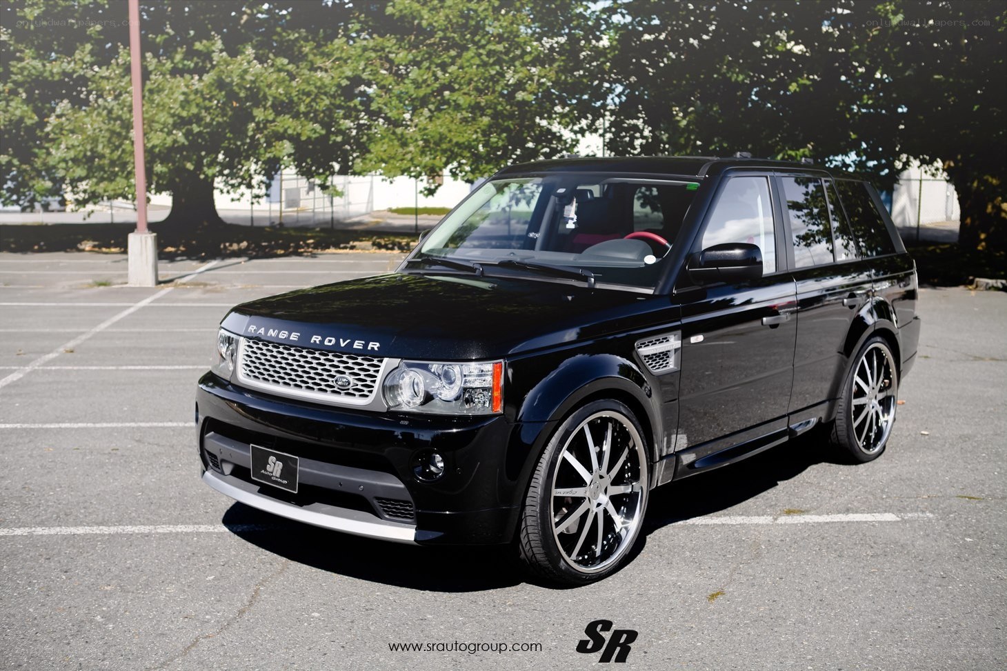 Black Range Rover in parking lot
