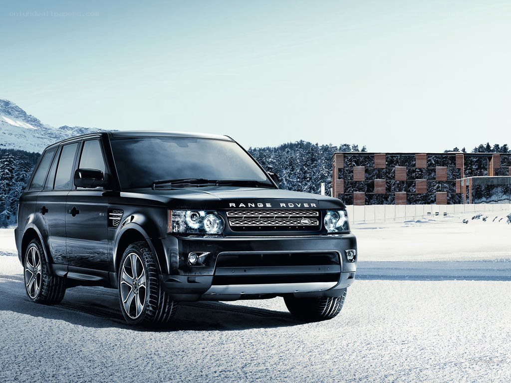 Black Range Rover in snowy landscape