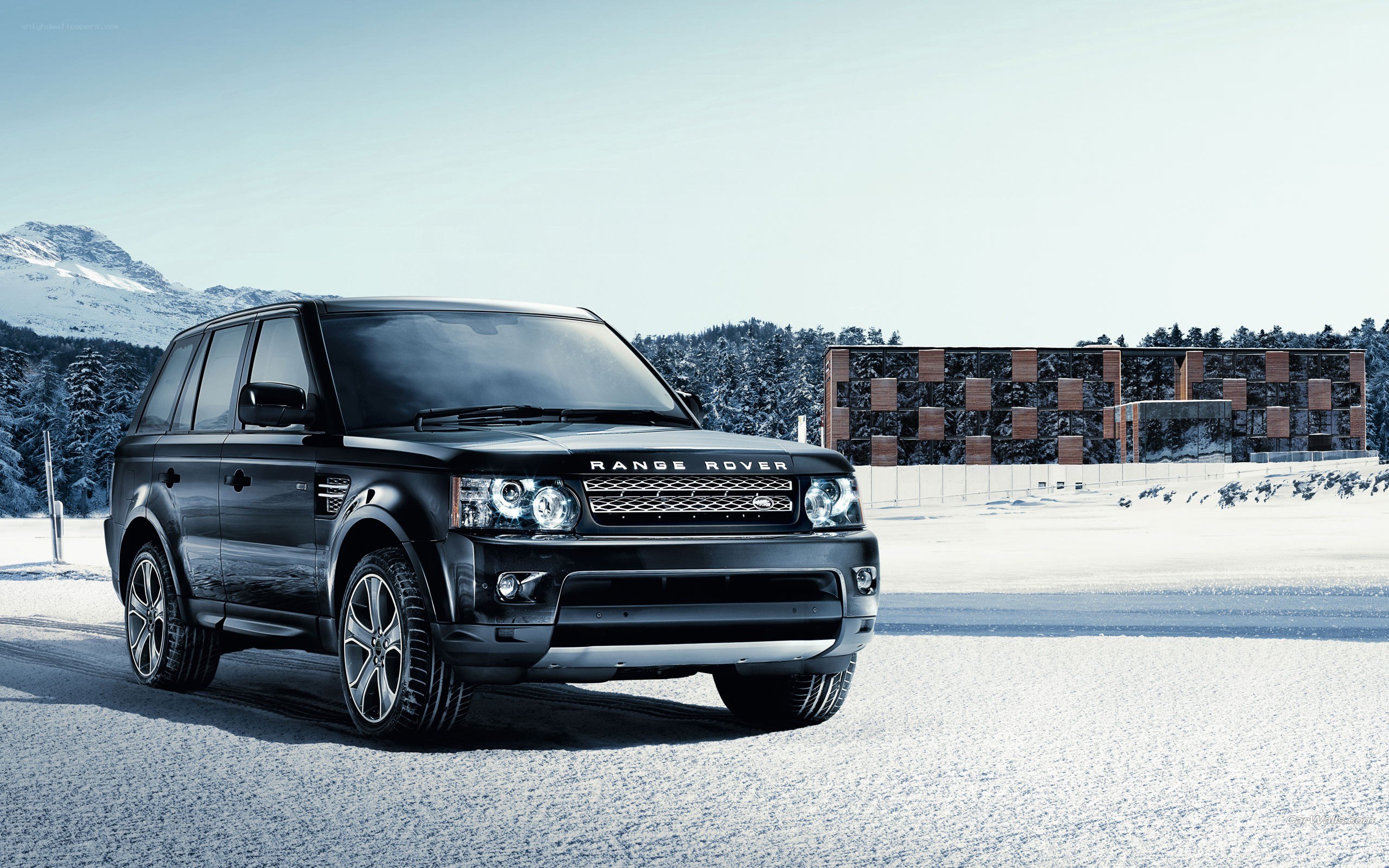 Black Range Rover in snowy landscape