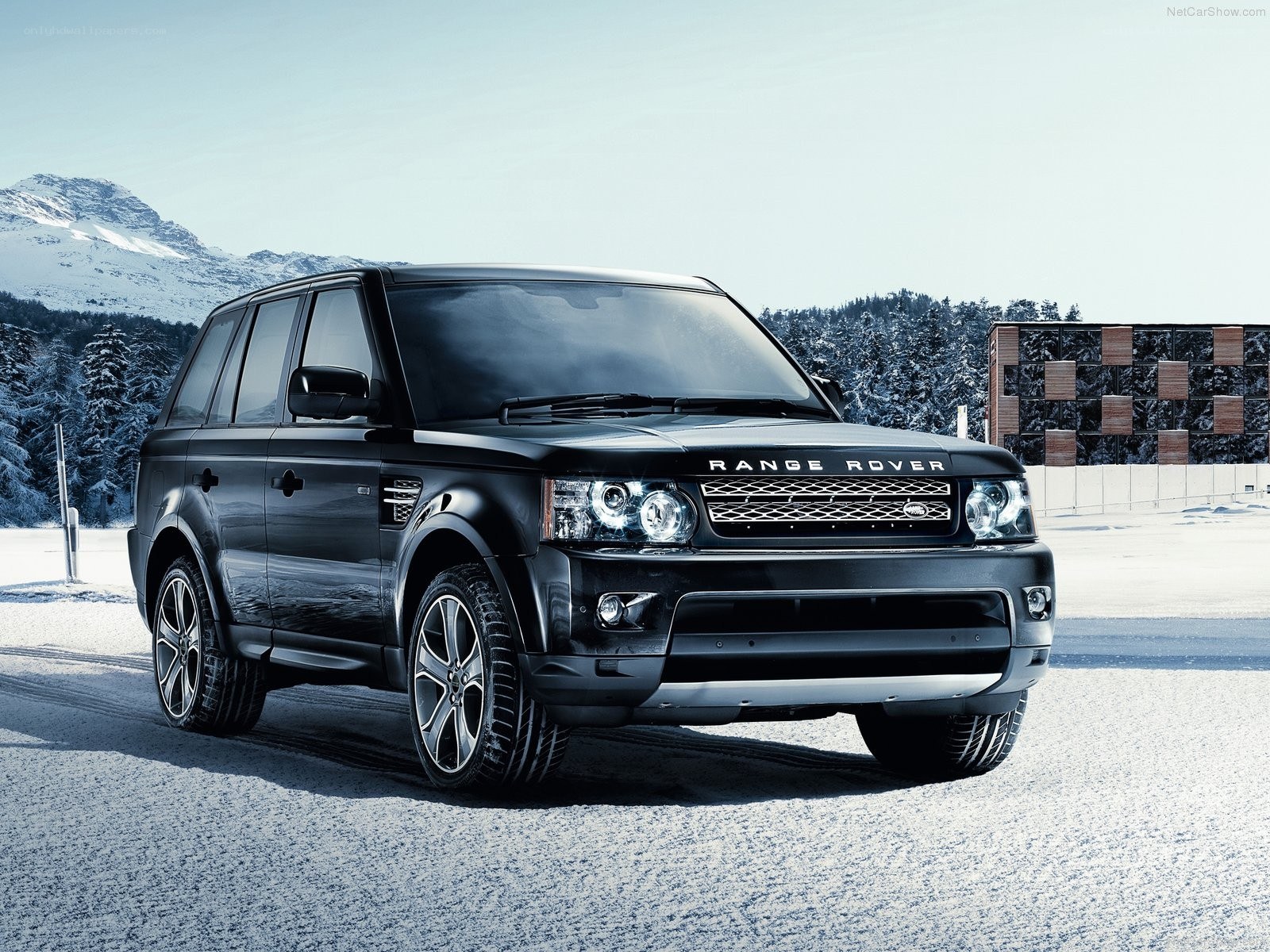 Black Range Rover in snowy landscape