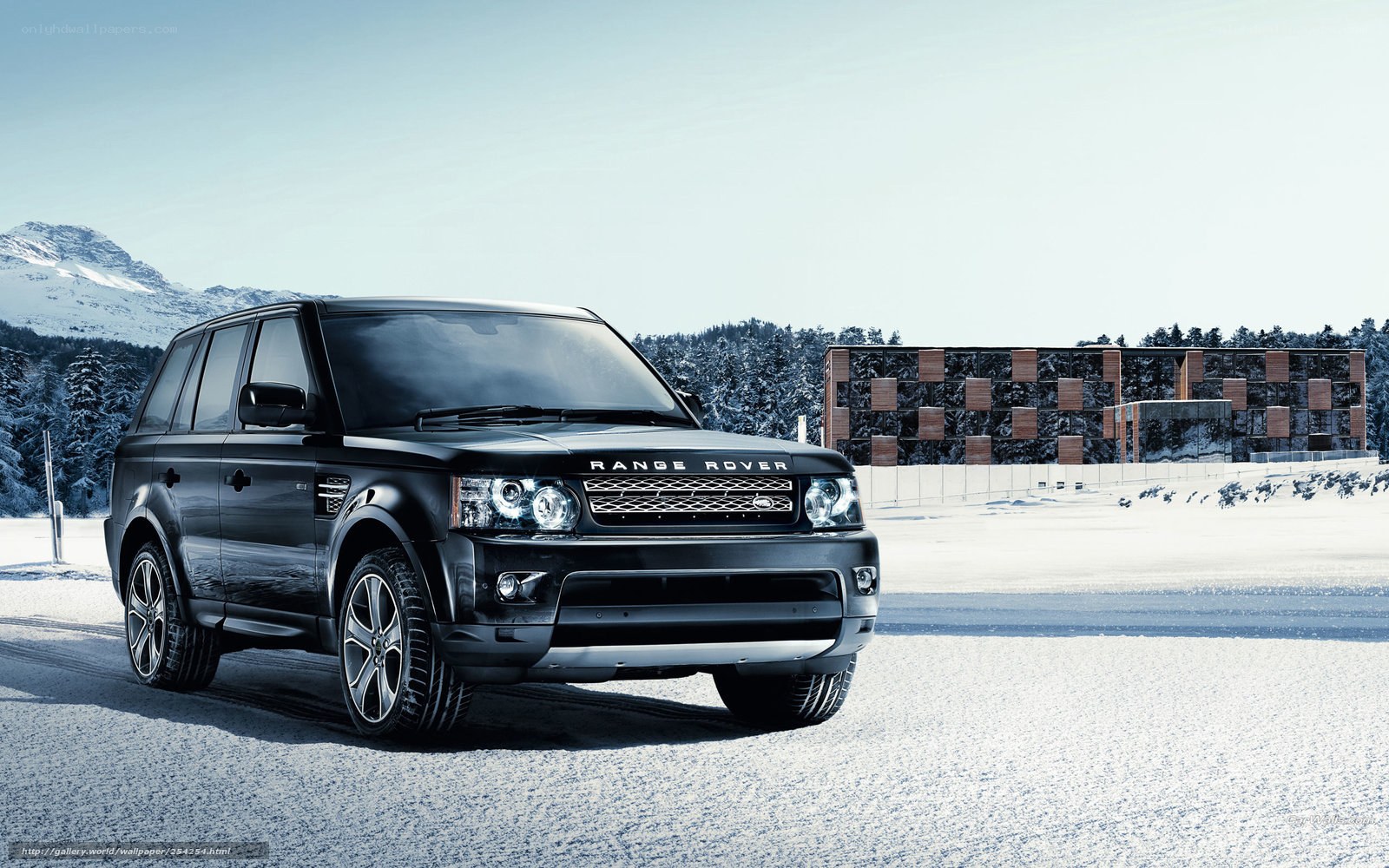 Black Range Rover in snowy landscape