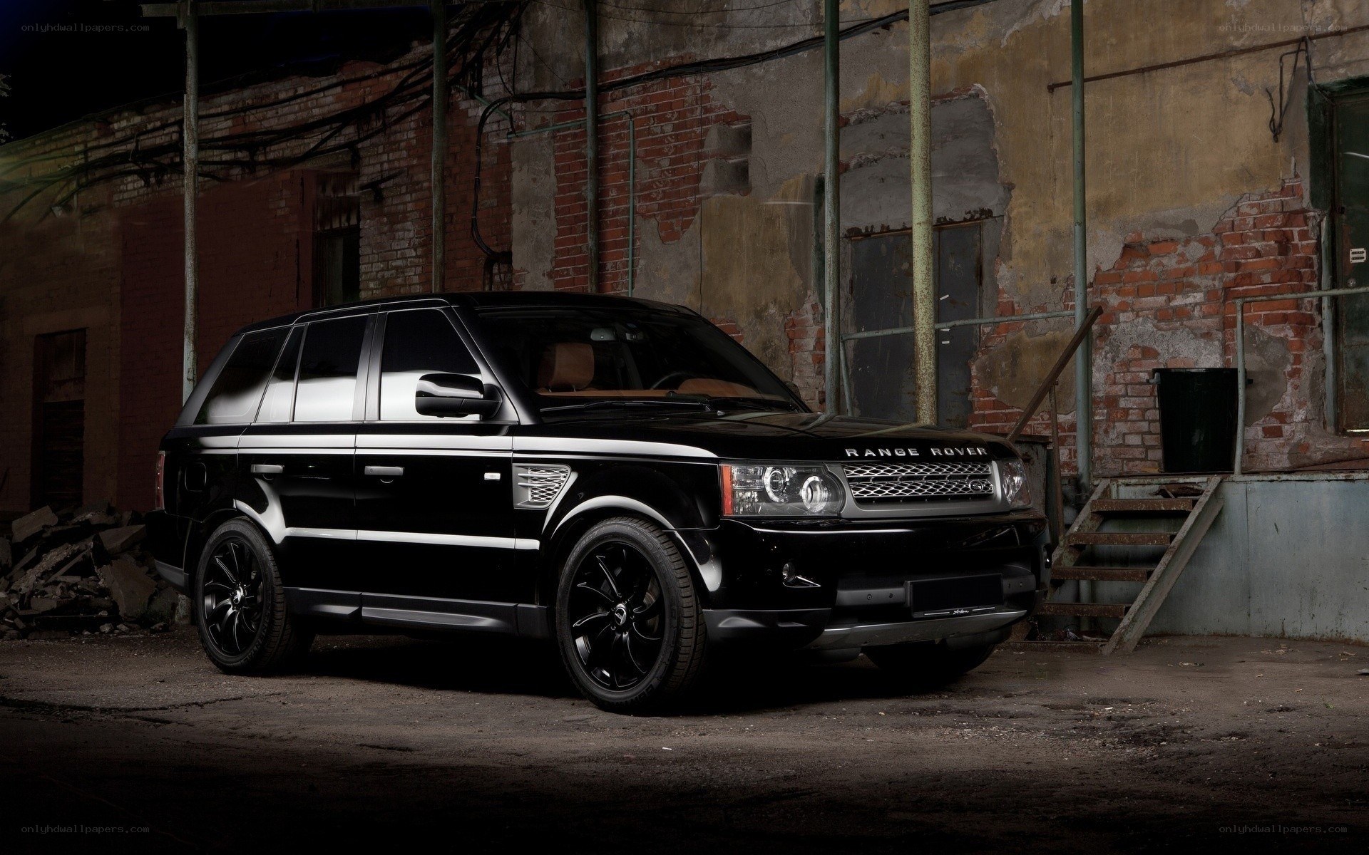 Black Range Rover in urban setting