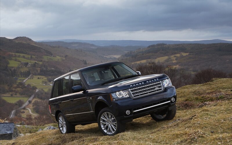 Black Range Rover on a hillside