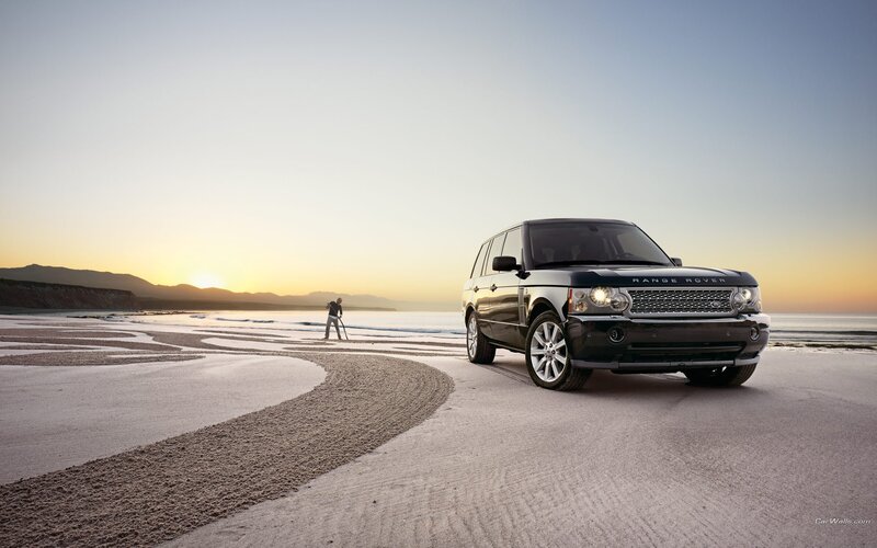 Black Range Rover on Beach — Beige