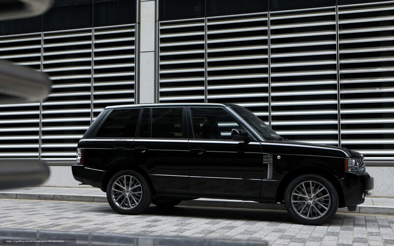 Black Range Rover on city street