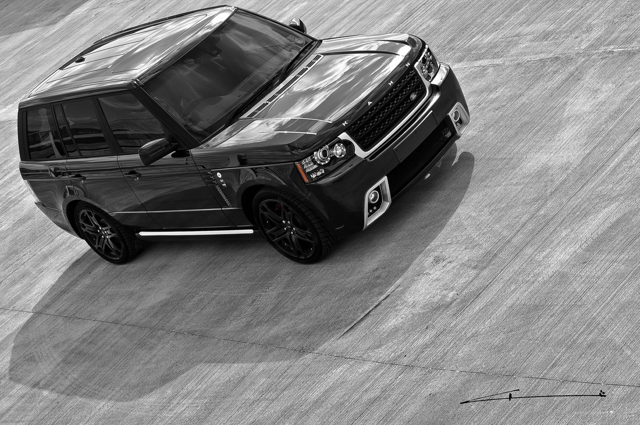 Black Range Rover on concrete