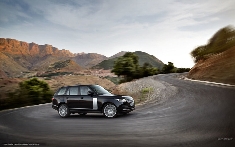 Black Range Rover on winding road
